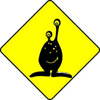 Alien_ Sign_ Yellow_ Background