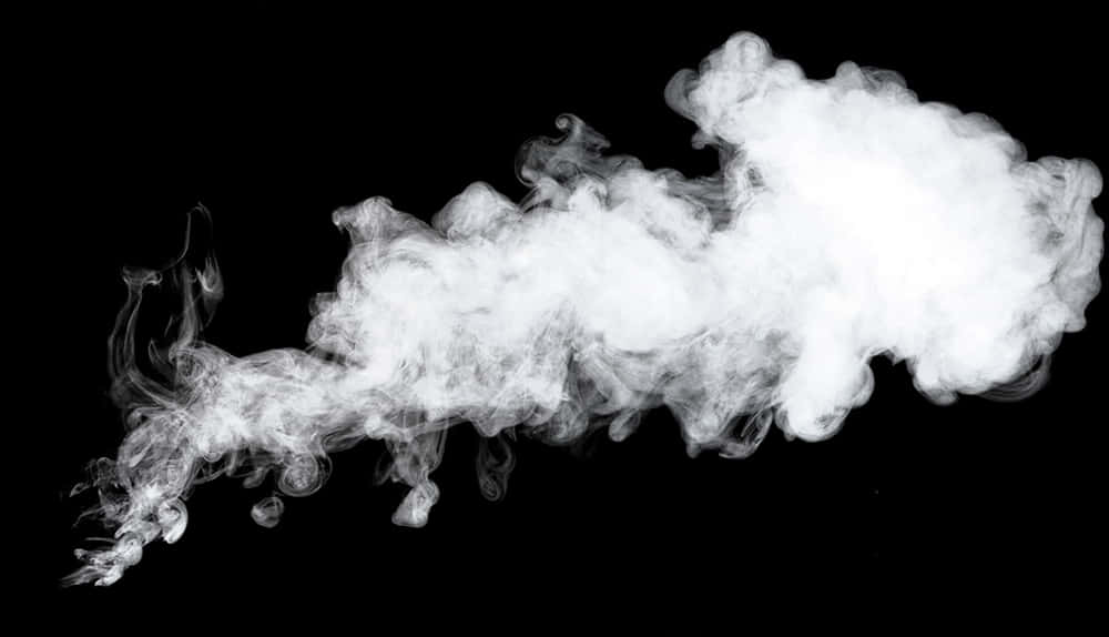 Billowing Steam Against Black Background.jpg