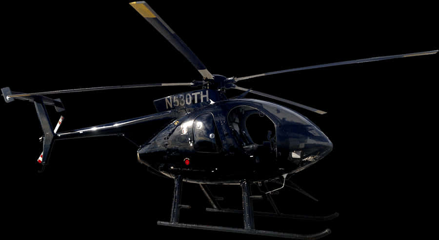 Black Helicopter Against Dark Background