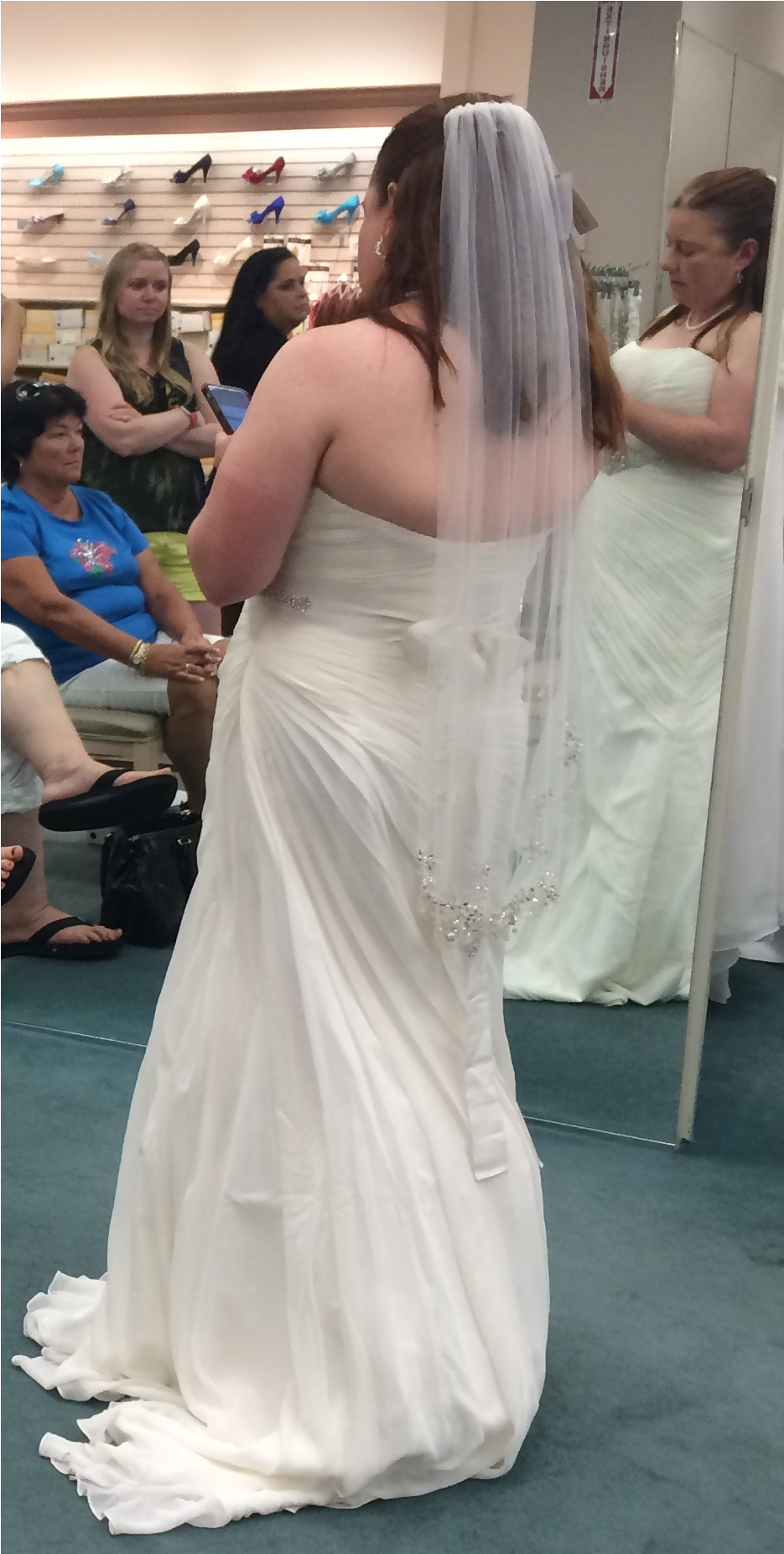 Bride Trying On Wedding Dress