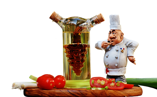 Chef Figurine With Olive Oiland Vegetables