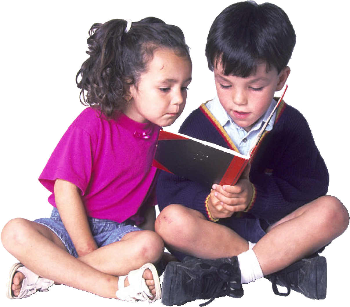 Children Reading Book Together