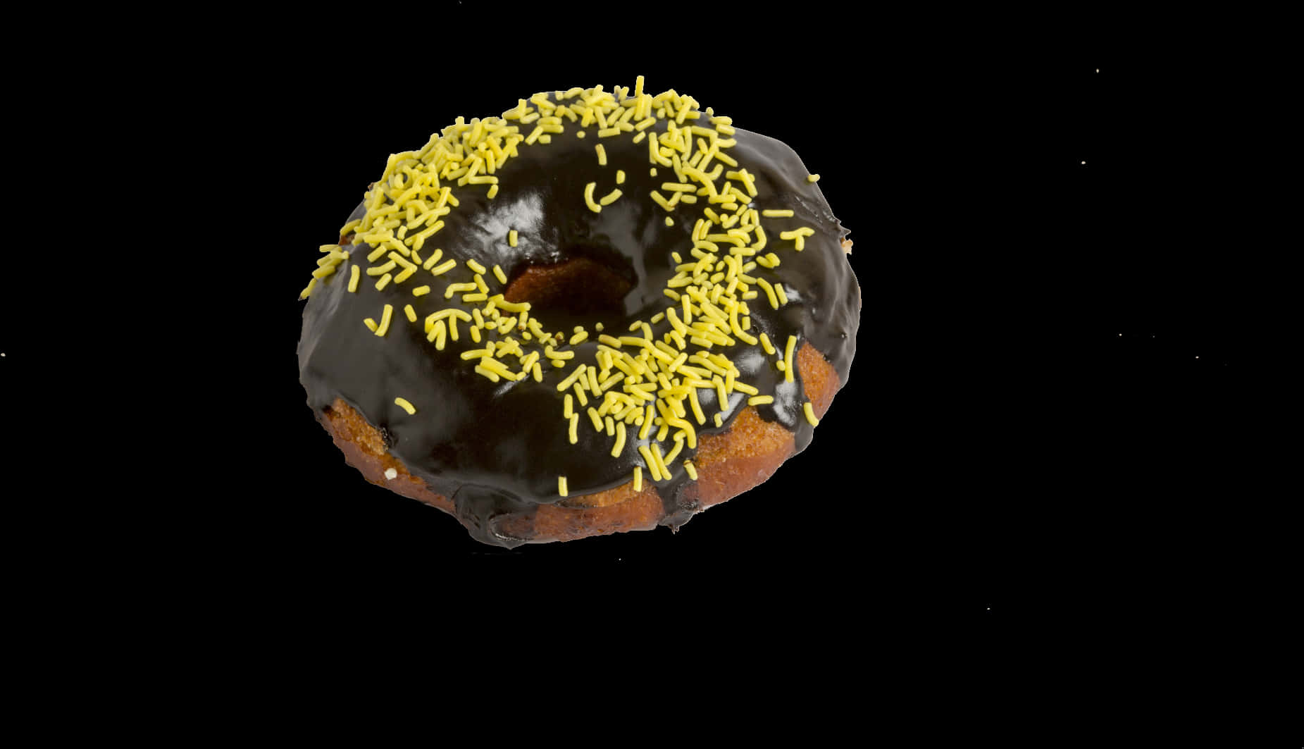 Chocolate Sprinkled Donut Black Background.jpg