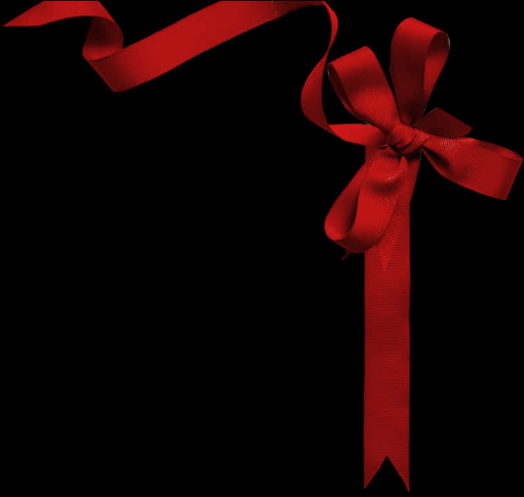 Elegant Red Ribbon Bowon Black Background