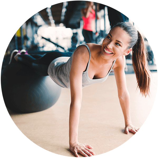 Fitness Enthusiast Performing Plankon Gym Ball