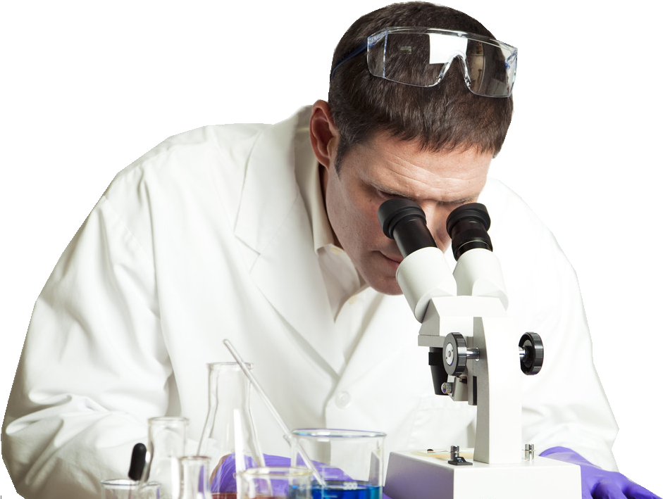 Focused Scientist Using Microscope