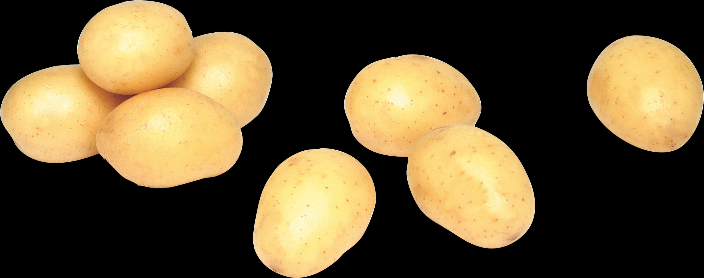 Fresh Potatoes Isolatedon Black Background