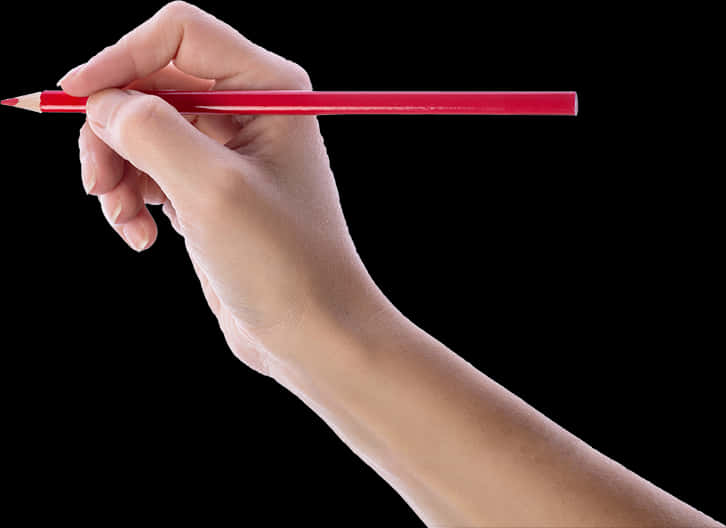 Hand Holding Red Pencil