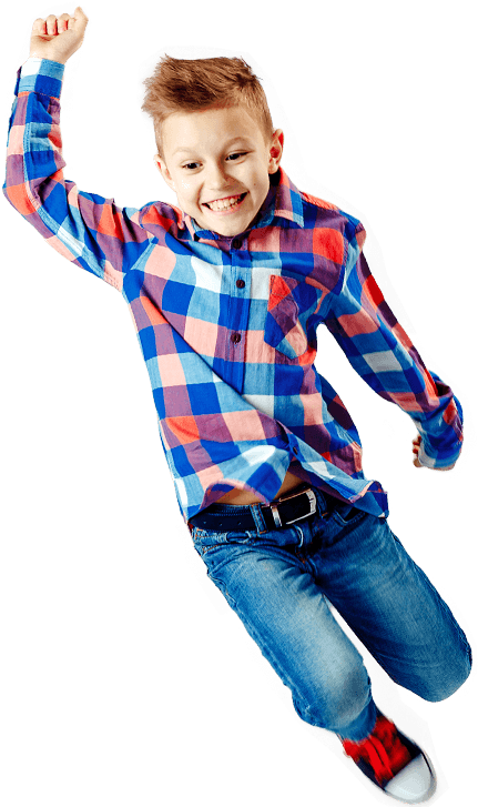 Happy Boy Jumping In Plaid Shirt