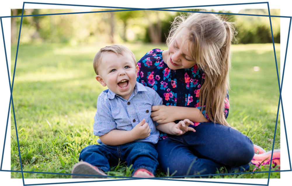 Joyful Siblings Playing Outdoors