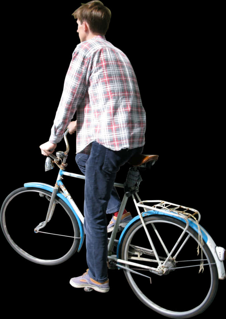 Man Mounting Bicycle