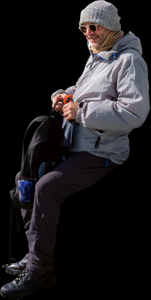 Man Sitting Outdoors Winter Gear