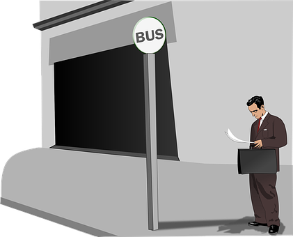 Man Waitingat Bus Stop