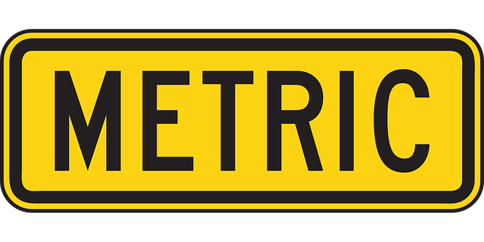 Metric Sign Yellow Black