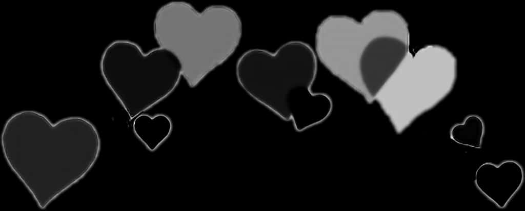Monochrome Hearts Against Black Background