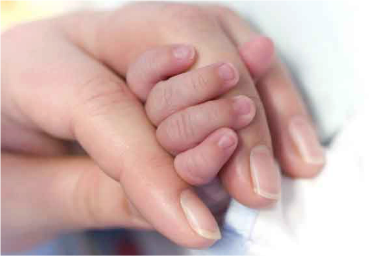 Newborn Baby Handin Parent Hand.jpg