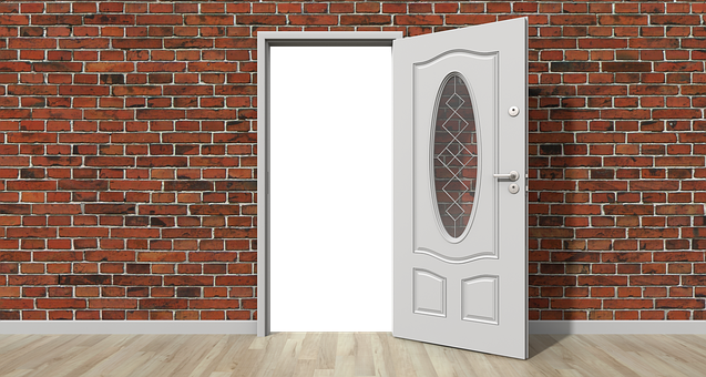 Open White Door Brick Wall