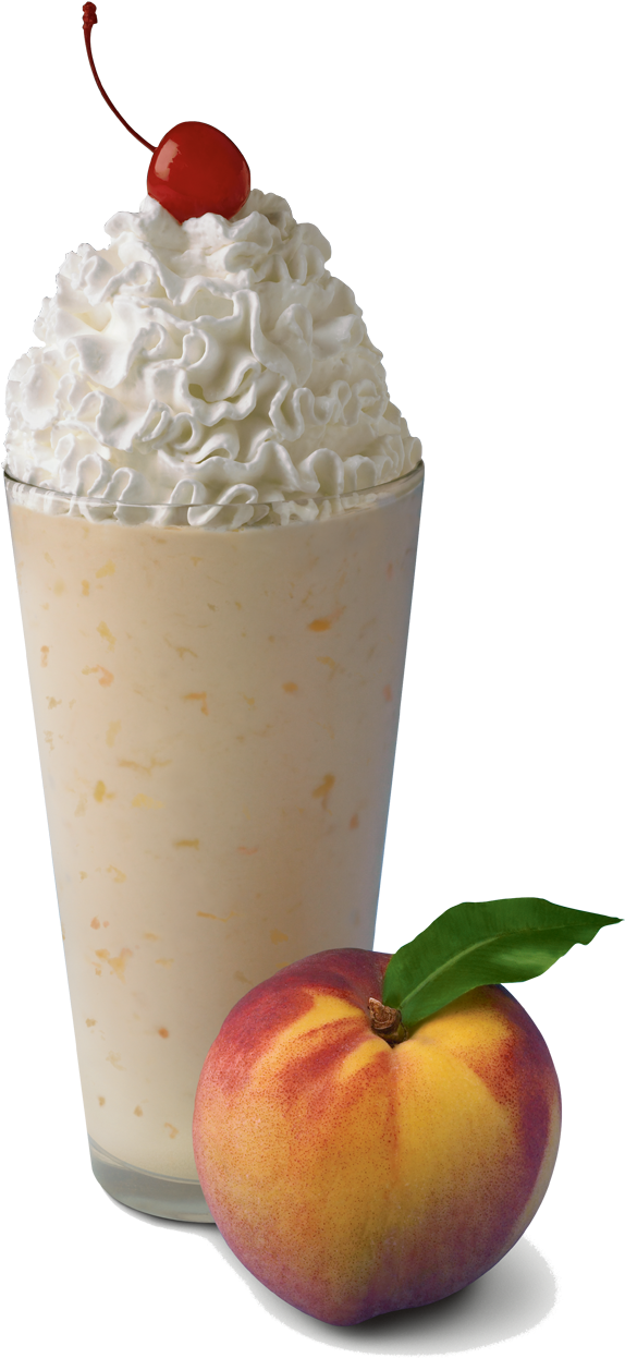 Peach Milkshake With Whipped Creamand Cherry