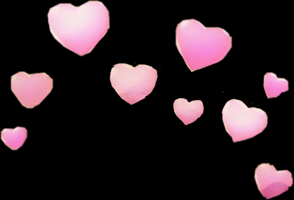 Pink Hearts Against Black Background