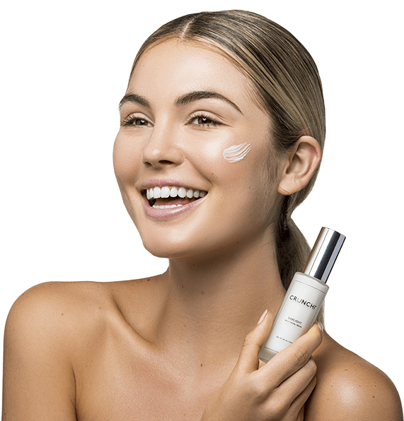 Smiling Woman Skincare Product Demonstration