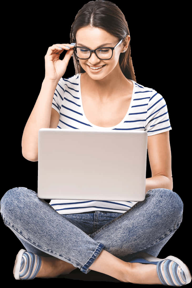 Smiling Woman Using Laptop Crosslegged