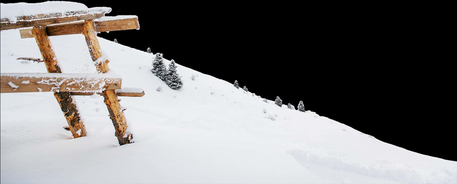 Snowy Hillsidewith Bench