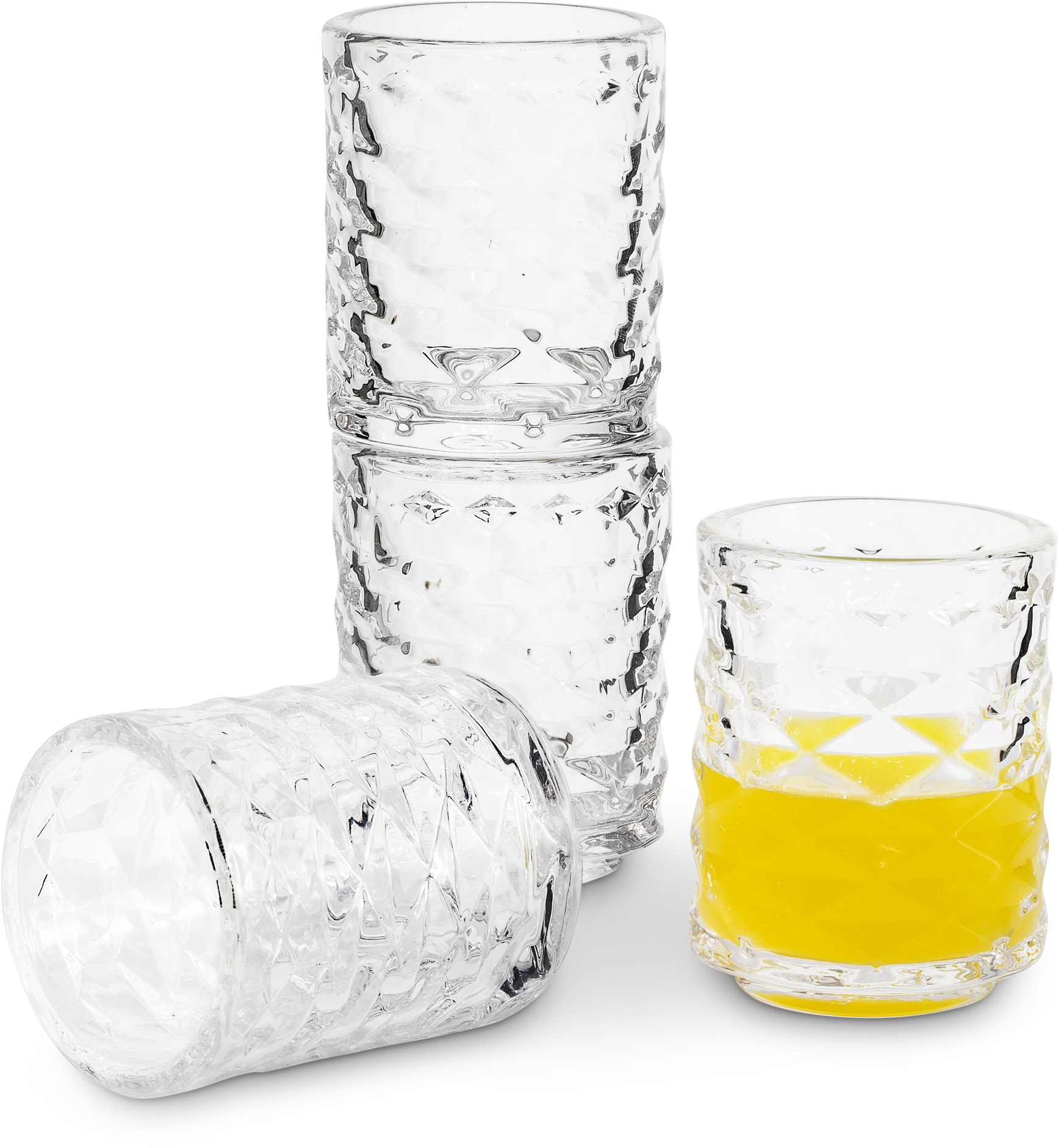 Stacked Crystal Glasses With Yellow Liquid