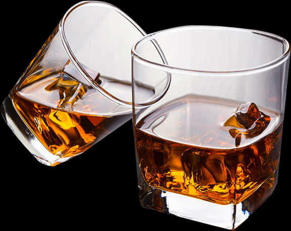Whiskey Glasses Tilted With Ice