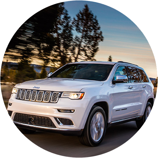 White Jeep Grand Cherokee On The Move