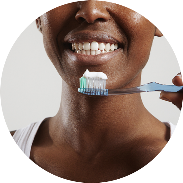 Woman Smiling With Toothbrush