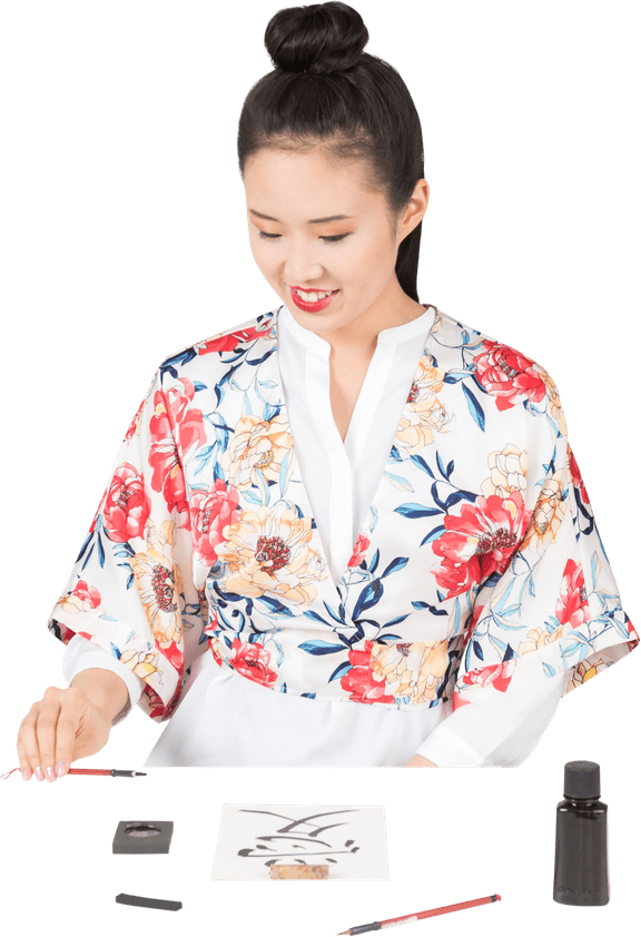 Womanin Floral Kimono Practicing Calligraphy