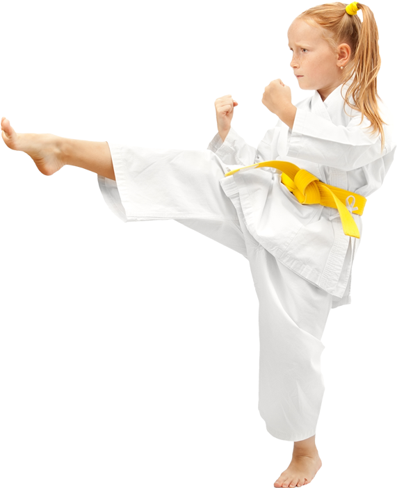 Young Karate Student Performing Kick
