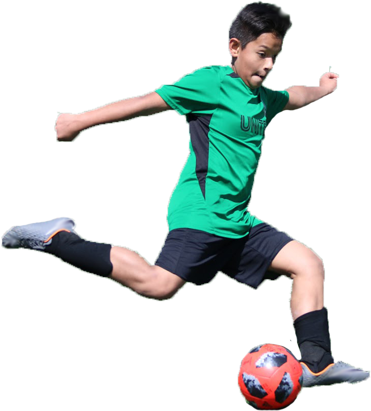 Youth Soccer Player Kicking Ball