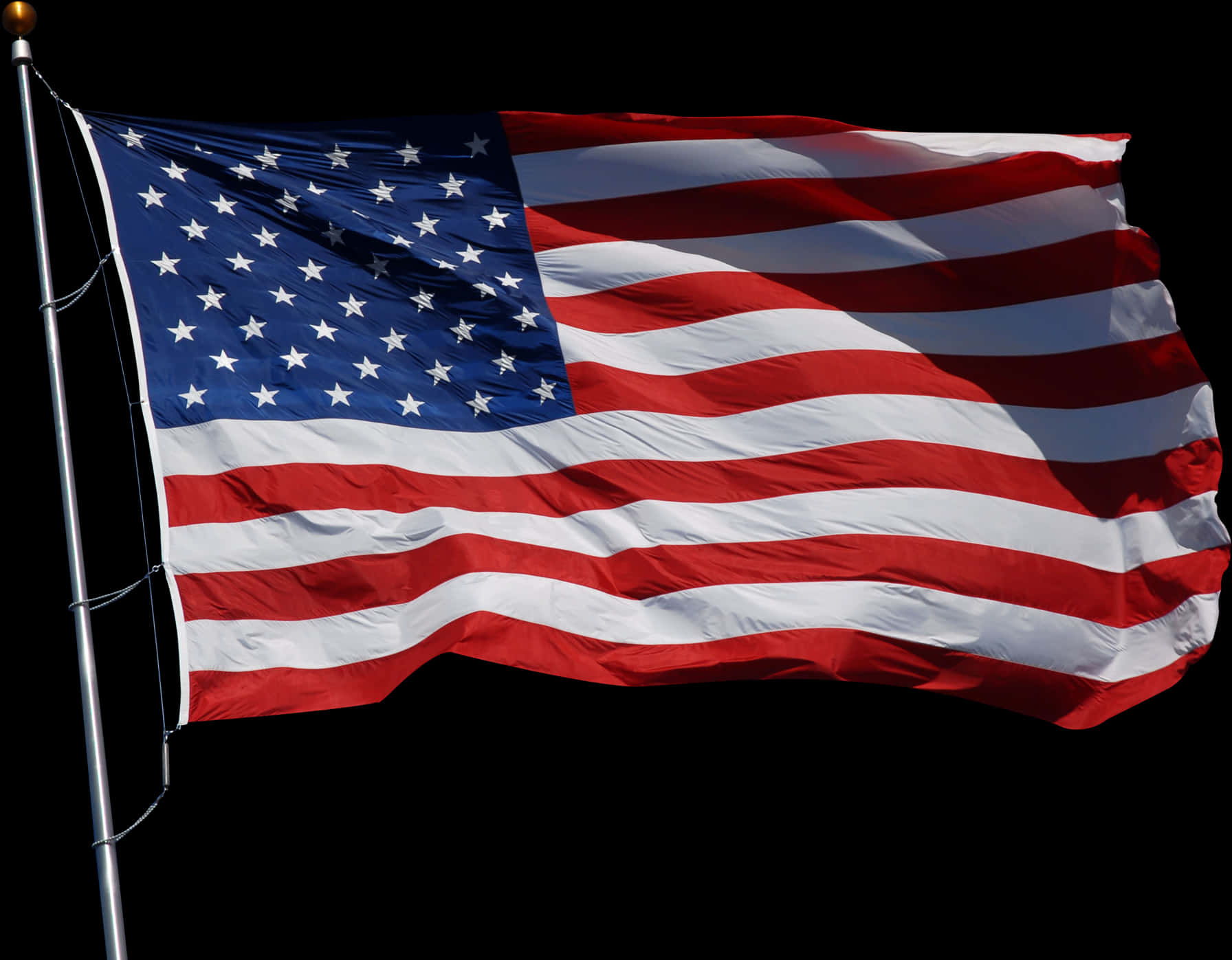 American Flag Waving Against Dark Background PNG image