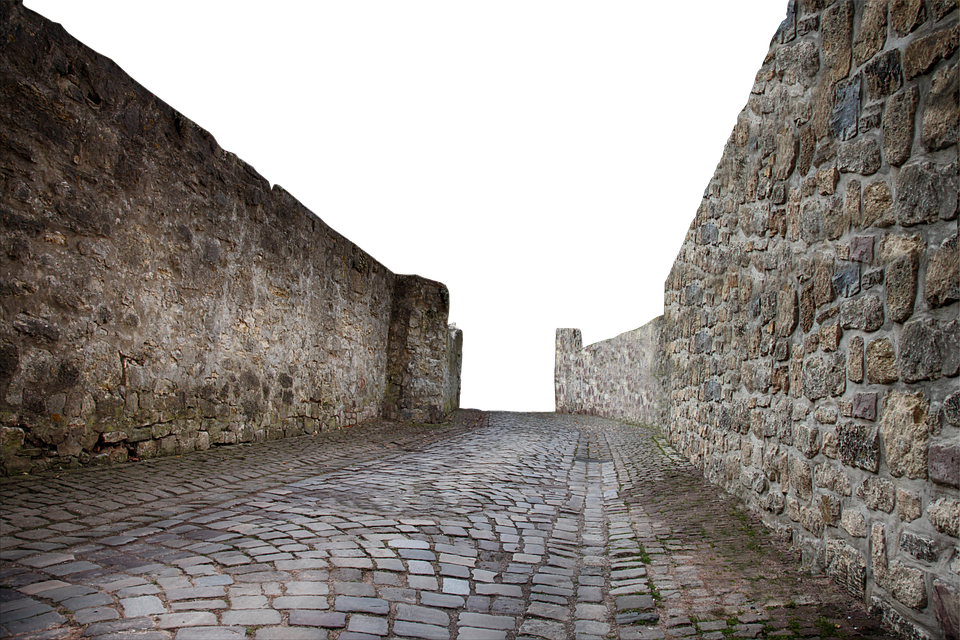 Ancient Stone Wallsand Cobbled Path PNG image