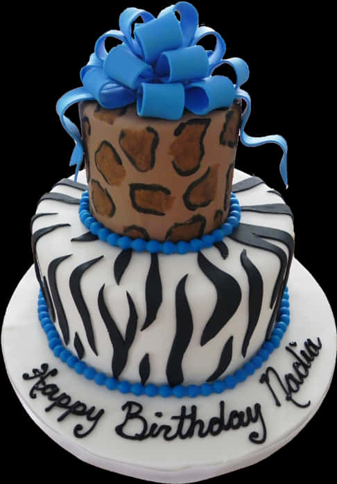 Animal Print Tiered Birthday Cakewith Blue Bow PNG image