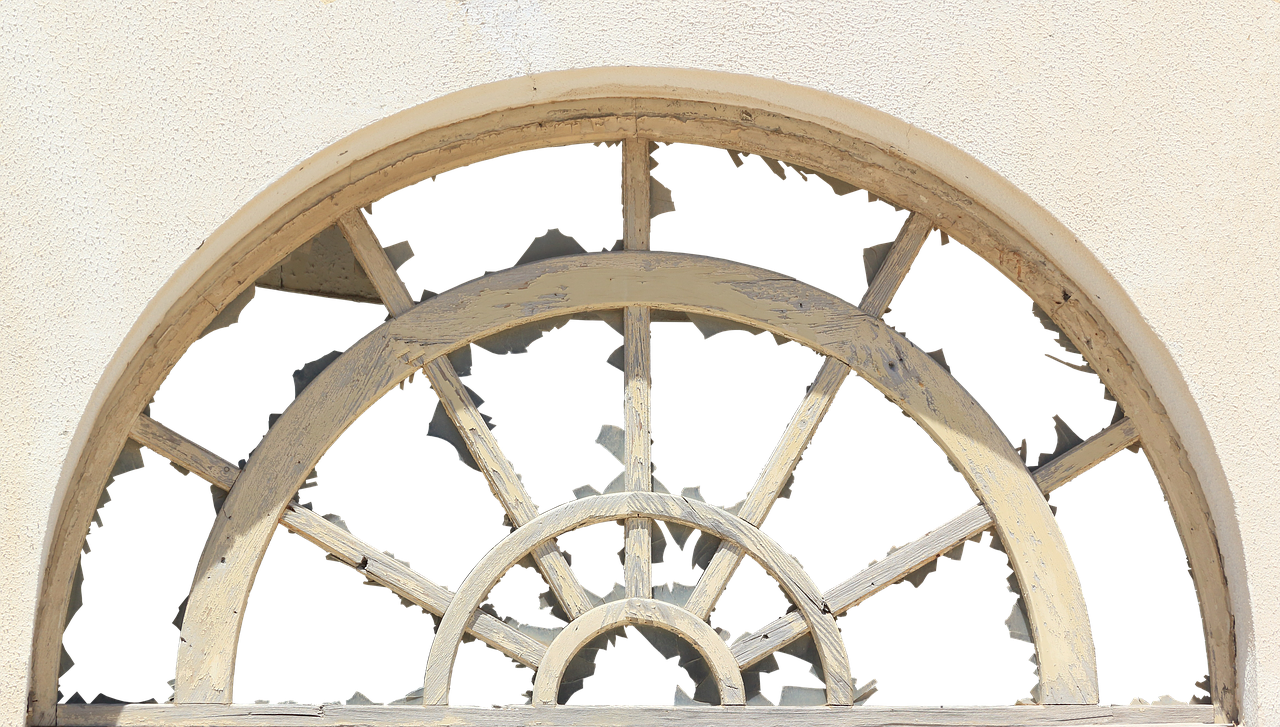 Arched Window With Wooden Wheel Decor PNG image