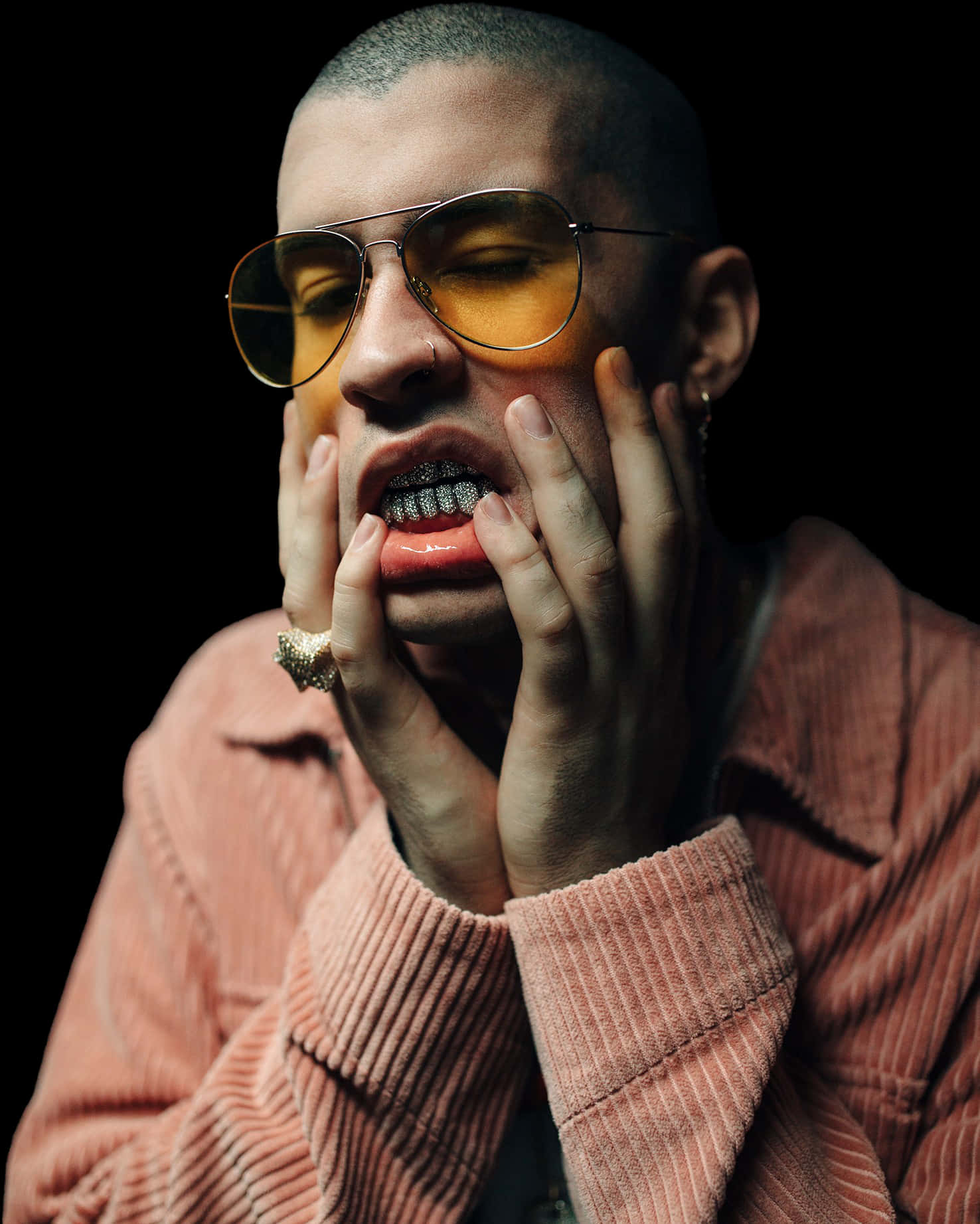 Bad Bunny Expressive Posewith Golden Grill PNG image