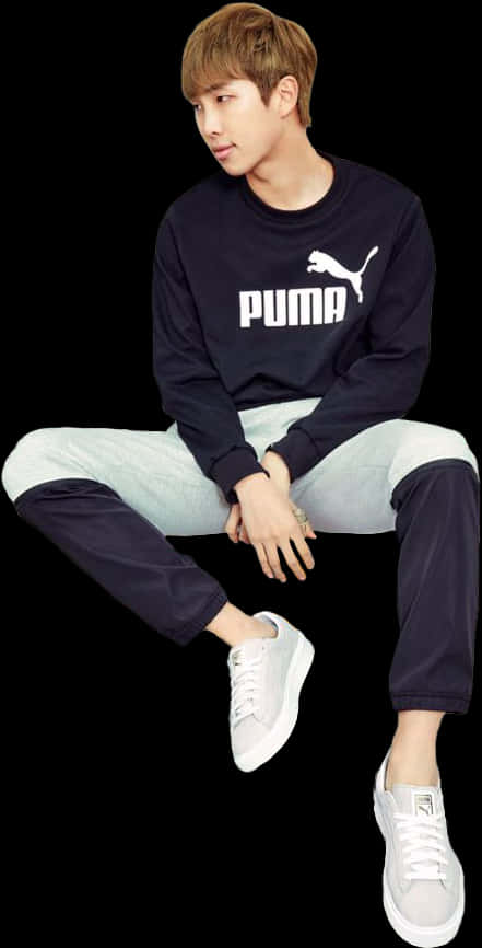 Casual Puma Outfit Sitting Pose PNG image
