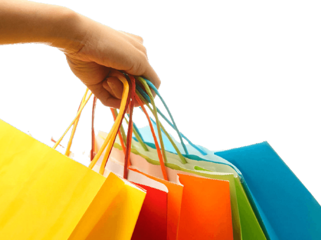 Colorful Shopping Bagsin Hand PNG image