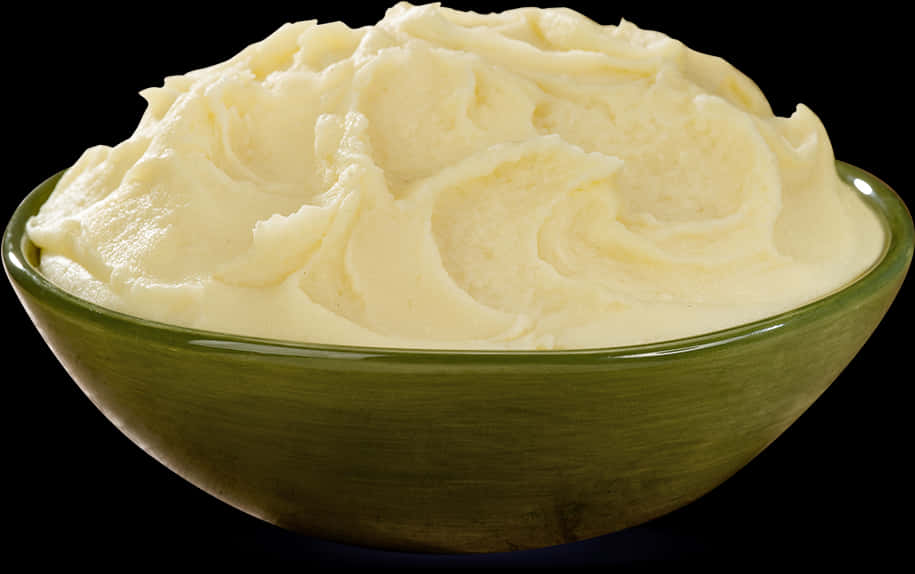 Creamy Mashed Potatoesin Green Bowl PNG image