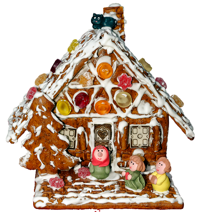 Decorated Gingerbread Housewith Figurines PNG image