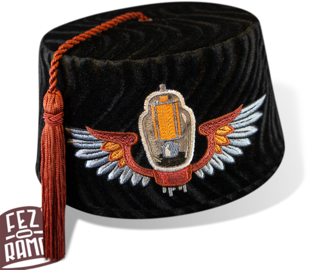 Embroidered Fez Hatwith Winged Emblem PNG image