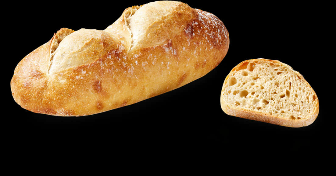 Fresh Baked Baguetteand Sliceon Black Background PNG image