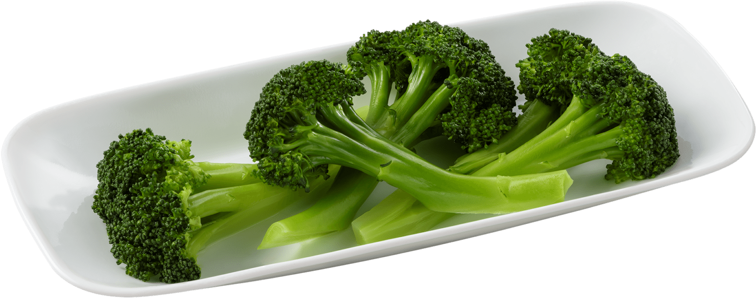 Fresh Broccoli Stalkson White Platter PNG image