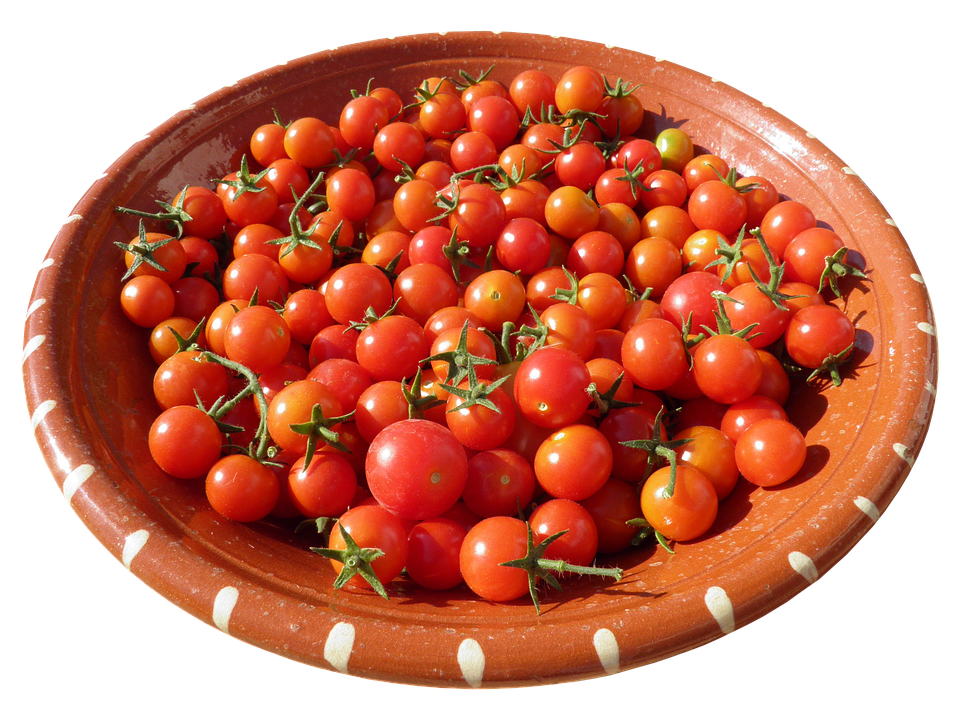 Fresh Cherry Tomatoesin Clay Bowl PNG image