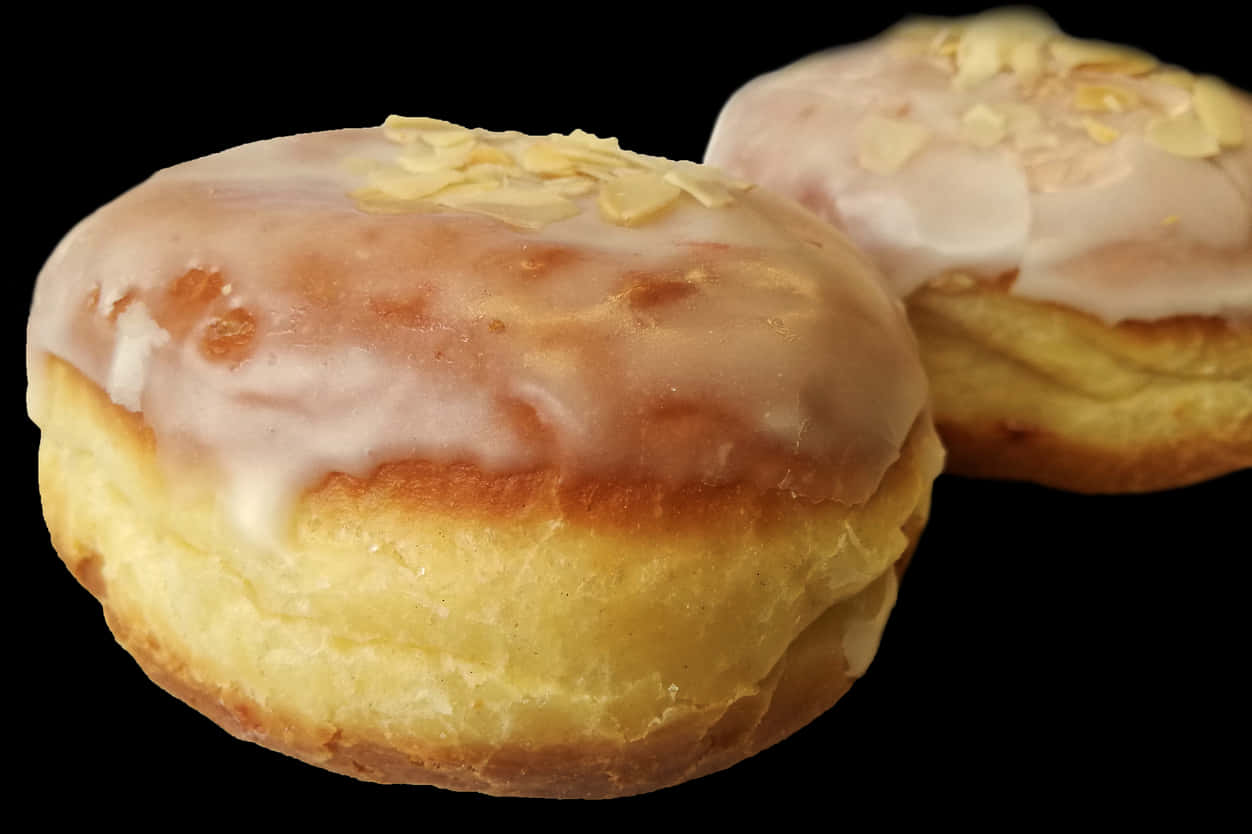 Glazed Almond Donuts Black Background PNG image