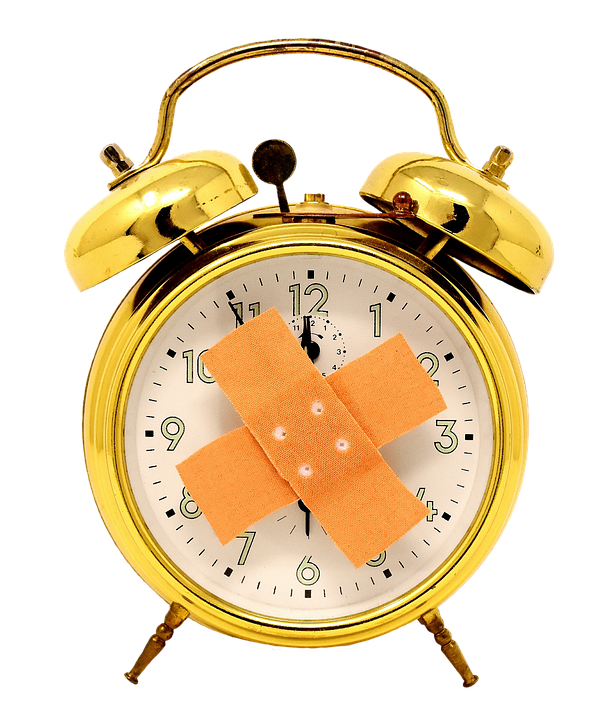 Golden Alarm Clock Bandaged PNG image