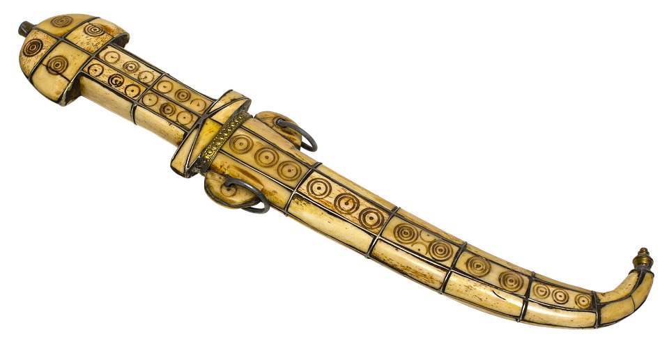 Golden Ceremonial Dagger Artifact PNG image