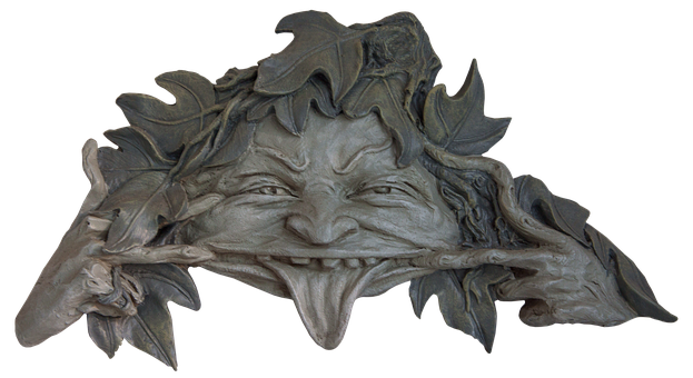 Green Man Leaf Mask Carving PNG image